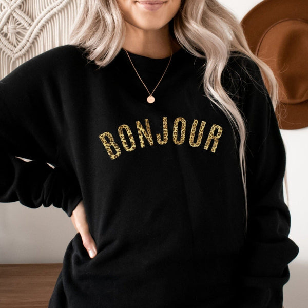 Black sweatshirt shop with gold writing